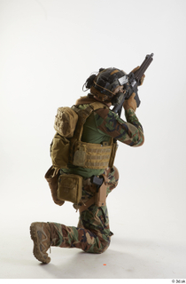 Photos Casey Schneider Army Dry Fire Suit Poses kneeling standing…